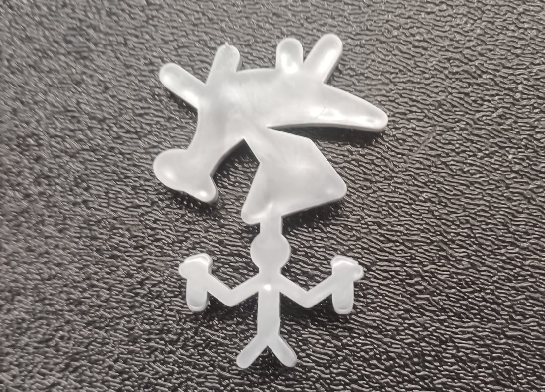 Injection molded decorative insert