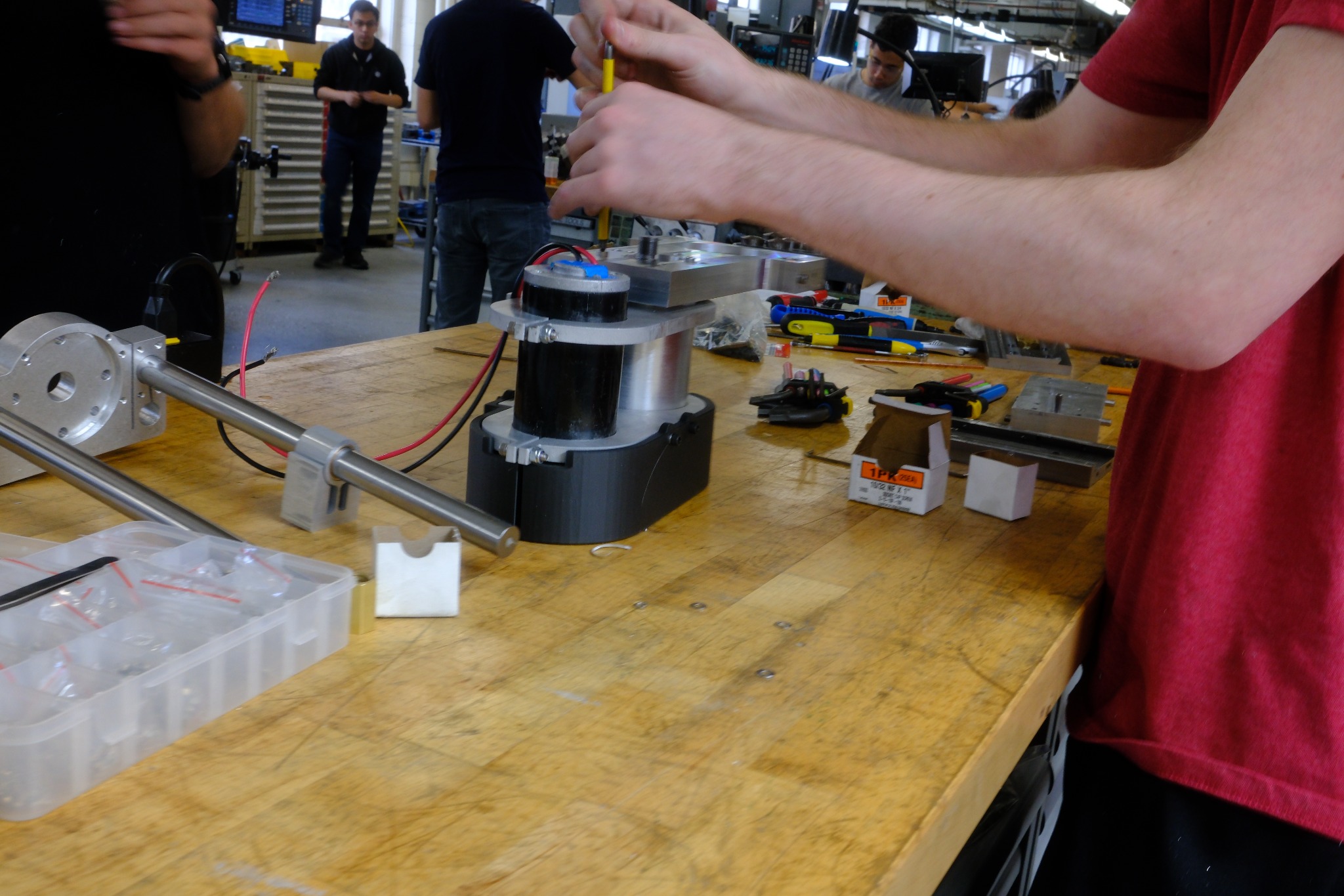 Partially assembled lathe components on a workbench