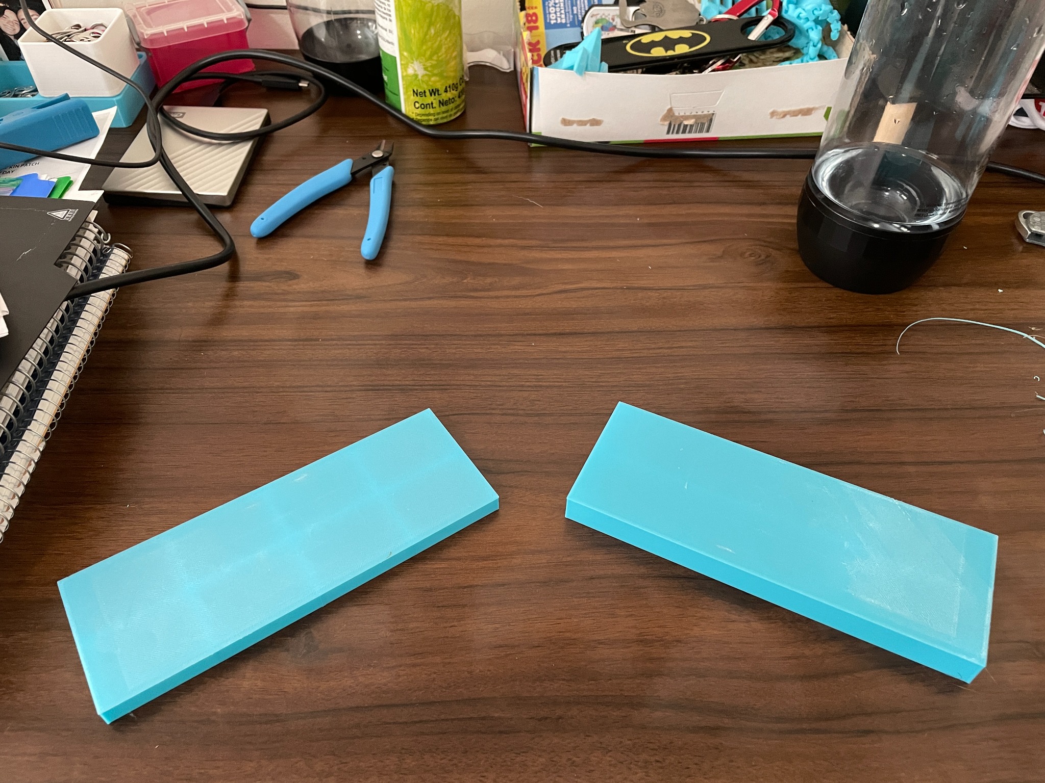 Two blue 3D-printed floor prototypes viewed from above
